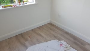 MDF skirting and oak laminate floor