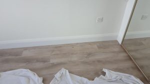 laminate oak floor with skirting greystones